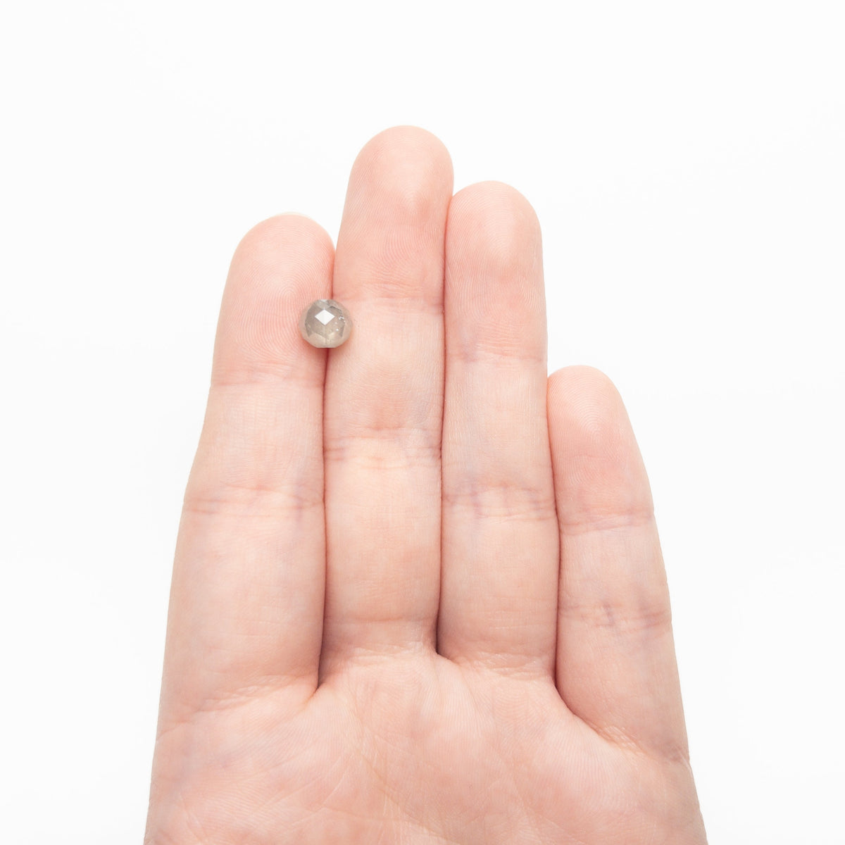The 2.92ct 6.68x6.90x6.90mm Faceted Bead 26554-03 by East London jeweller Rachel Boston | Discover our collections of unique and timeless engagement rings, wedding rings, and modern fine jewellery.