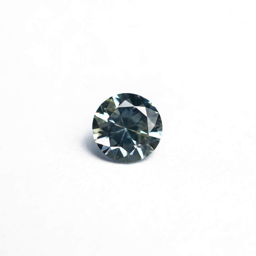 The 0.66ct 5.20x5.17x3.33mm Round Brilliant Sapphire 26556-12 by East London jeweller Rachel Boston | Discover our collections of unique and timeless engagement rings, wedding rings, and modern fine jewellery. - Rachel Boston Jewellery