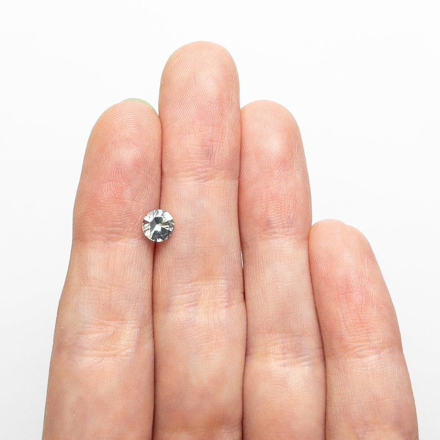 The 0.66ct 5.20x5.17x3.33mm Round Brilliant Sapphire 26556-12 by East London jeweller Rachel Boston | Discover our collections of unique and timeless engagement rings, wedding rings, and modern fine jewellery. - Rachel Boston Jewellery