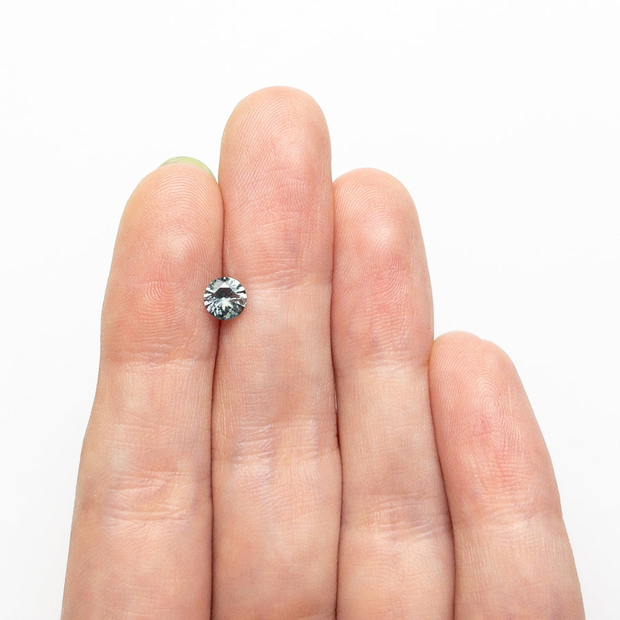 The 0.54ct 4.99x4.98x2.96mm Round Brilliant Sapphire 26556-13 by East London jeweller Rachel Boston | Discover our collections of unique and timeless engagement rings, wedding rings, and modern fine jewellery. - Rachel Boston Jewellery