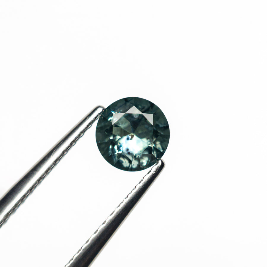 The 0.58ct 5.27x5.23x2.83mm Round Brilliant Sapphire 26556-15 by East London jeweller Rachel Boston | Discover our collections of unique and timeless engagement rings, wedding rings, and modern fine jewellery. - Rachel Boston Jewellery