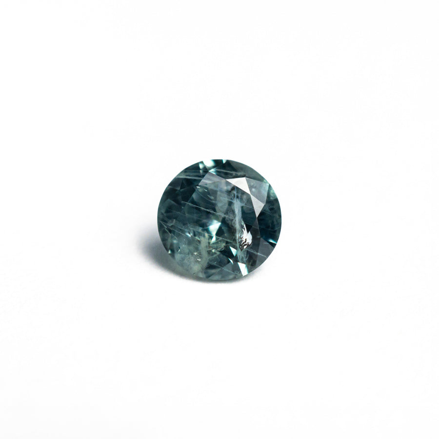 The 0.66ct 5.32x5.27x3.20mm Round Brilliant Sapphire 26556-18 by East London jeweller Rachel Boston | Discover our collections of unique and timeless engagement rings, wedding rings, and modern fine jewellery. - Rachel Boston Jewellery