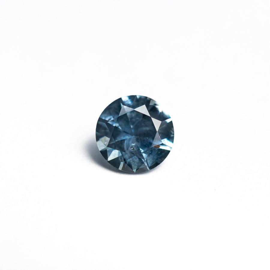 The 0.74ct 5.45x5.41x3.48mm Round Brilliant Sapphire 26556-19 by East London jeweller Rachel Boston | Discover our collections of unique and timeless engagement rings, wedding rings, and modern fine jewellery. - Rachel Boston Jewellery