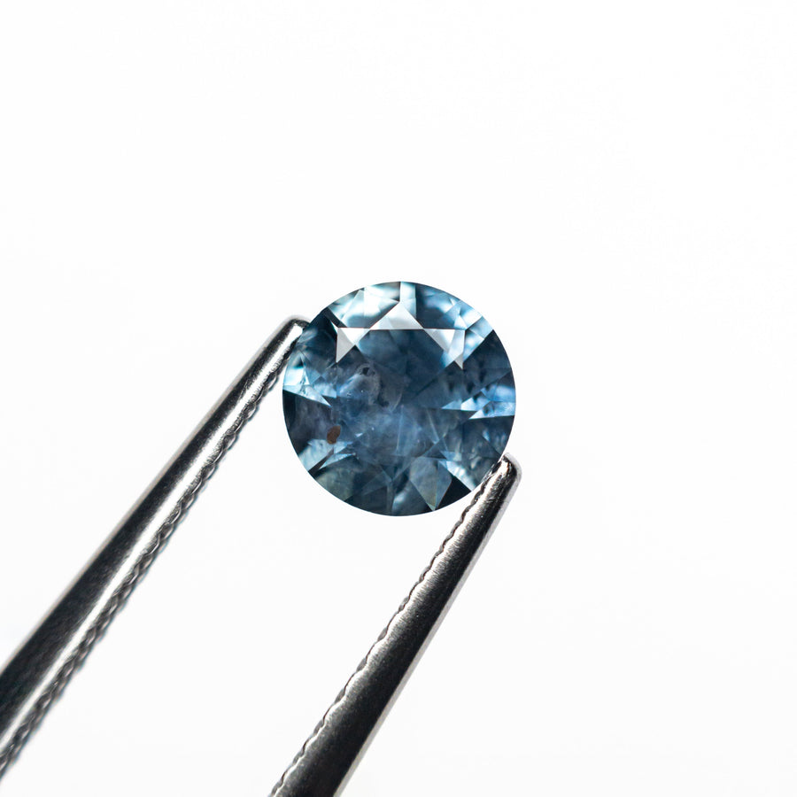The 0.74ct 5.45x5.41x3.48mm Round Brilliant Sapphire 26556-19 by East London jeweller Rachel Boston | Discover our collections of unique and timeless engagement rings, wedding rings, and modern fine jewellery. - Rachel Boston Jewellery