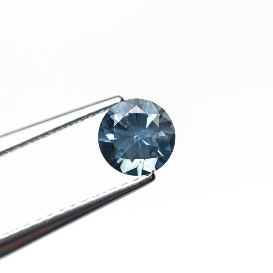 The 0.70ct 5.29x5.27x3.60mm Round Brilliant Sapphire 26556-23 by East London jeweller Rachel Boston | Discover our collections of unique and timeless engagement rings, wedding rings, and modern fine jewellery. - Rachel Boston Jewellery