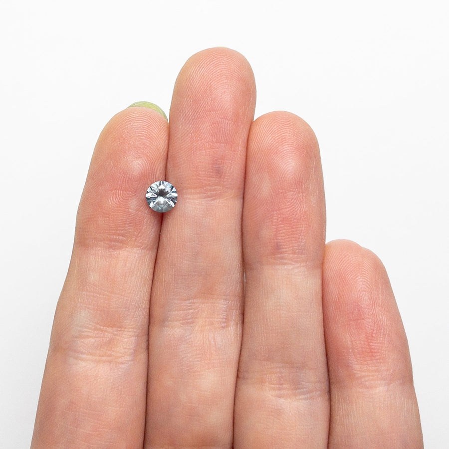 The 0.57ct 4.97x4.94x3.12mm Round Brilliant Sapphire 26556-25 by East London jeweller Rachel Boston | Discover our collections of unique and timeless engagement rings, wedding rings, and modern fine jewellery. - Rachel Boston Jewellery