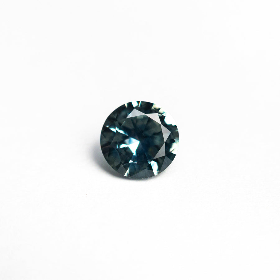 The 0.65ct 5.31x5.28x3.10mm Round Brilliant Sapphire 26556-27 by East London jeweller Rachel Boston | Discover our collections of unique and timeless engagement rings, wedding rings, and modern fine jewellery. - Rachel Boston Jewellery