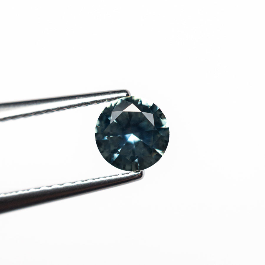 The 0.65ct 5.31x5.28x3.10mm Round Brilliant Sapphire 26556-27 by East London jeweller Rachel Boston | Discover our collections of unique and timeless engagement rings, wedding rings, and modern fine jewellery. - Rachel Boston Jewellery