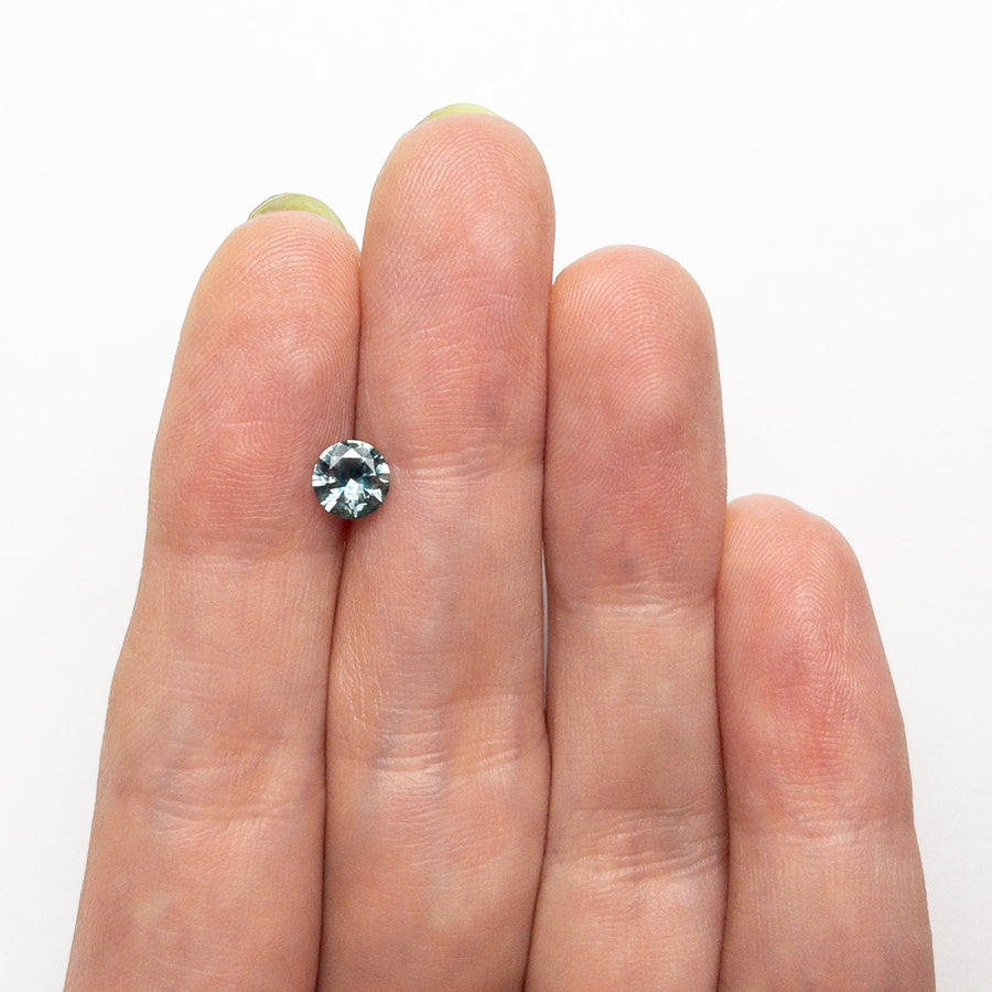 The 0.65ct 5.31x5.28x3.10mm Round Brilliant Sapphire 26556-27 by East London jeweller Rachel Boston | Discover our collections of unique and timeless engagement rings, wedding rings, and modern fine jewellery. - Rachel Boston Jewellery