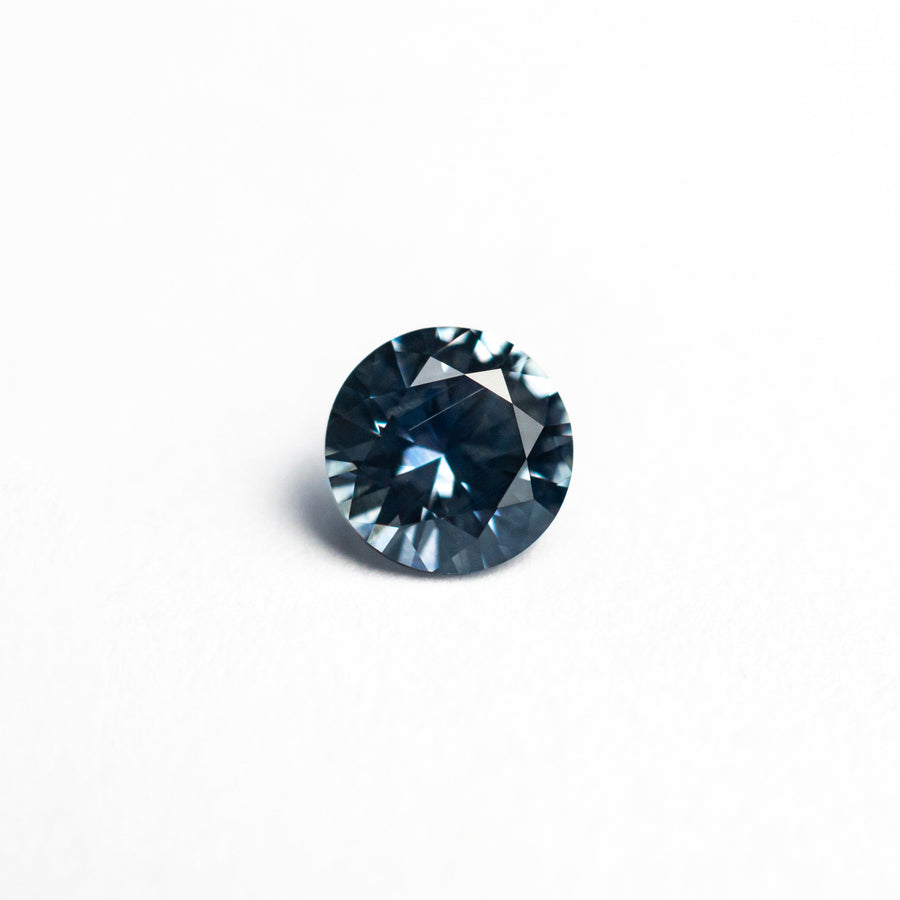 The 0.65ct 5.23x5.21x3.26mm Round Brilliant Sapphire 26556-29 by East London jeweller Rachel Boston | Discover our collections of unique and timeless engagement rings, wedding rings, and modern fine jewellery. - Rachel Boston Jewellery