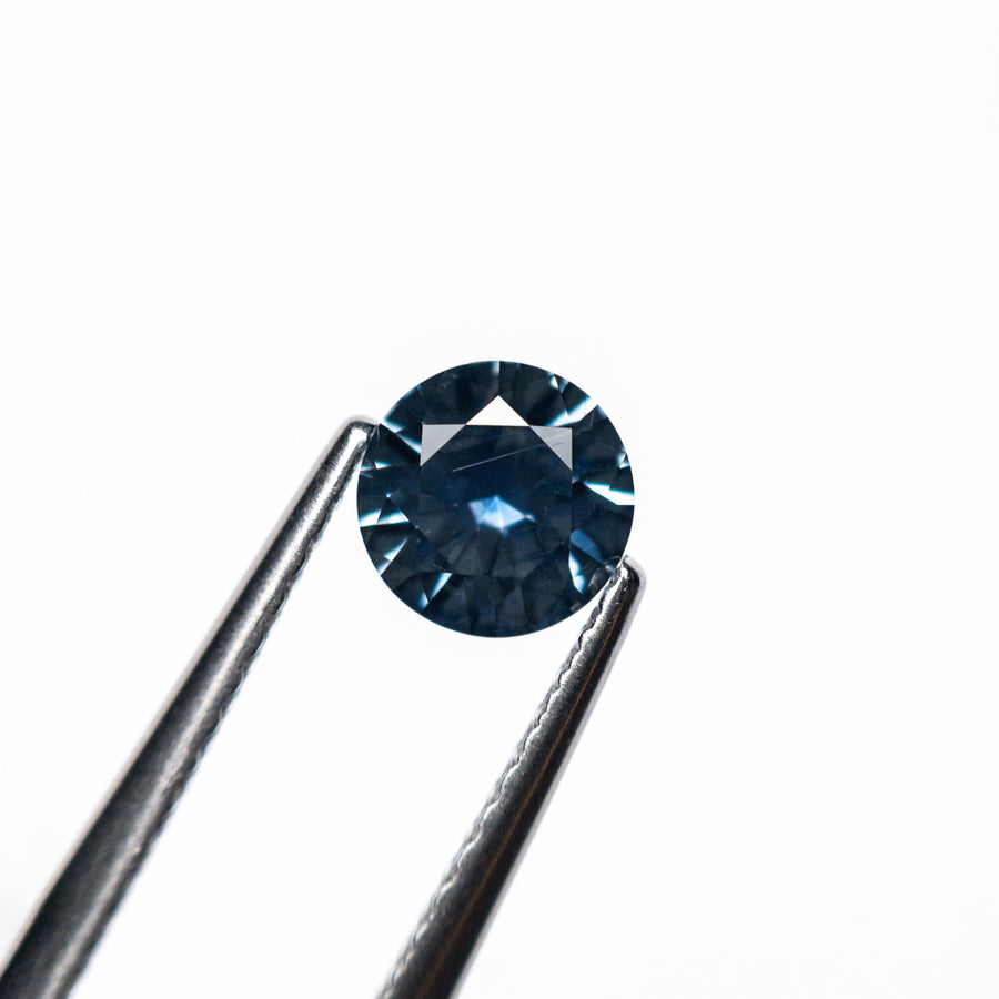 The 0.65ct 5.23x5.21x3.26mm Round Brilliant Sapphire 26556-29 by East London jeweller Rachel Boston | Discover our collections of unique and timeless engagement rings, wedding rings, and modern fine jewellery. - Rachel Boston Jewellery