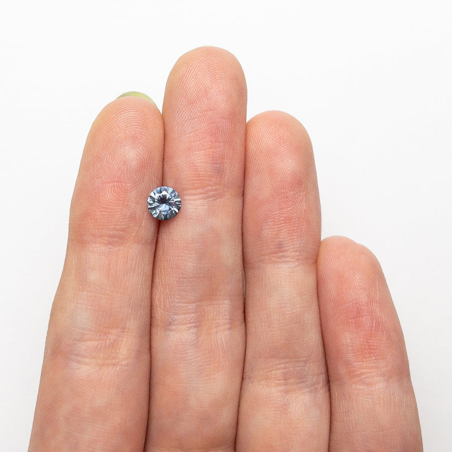 The 0.65ct 5.23x5.21x3.26mm Round Brilliant Sapphire 26556-29 by East London jeweller Rachel Boston | Discover our collections of unique and timeless engagement rings, wedding rings, and modern fine jewellery. - Rachel Boston Jewellery