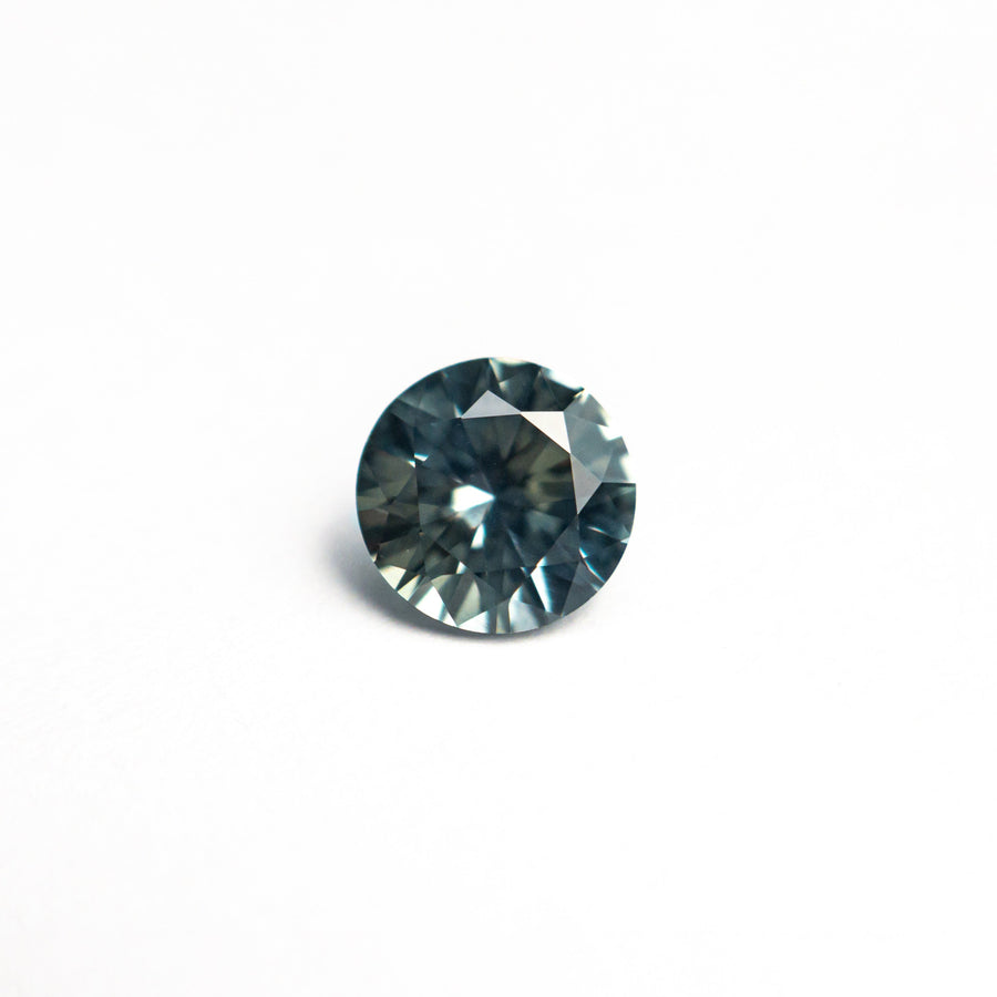 The 0.64ct 5.27x5.20x3.21mm Round Brilliant Sapphire 26556-32 by East London jeweller Rachel Boston | Discover our collections of unique and timeless engagement rings, wedding rings, and modern fine jewellery. - Rachel Boston Jewellery