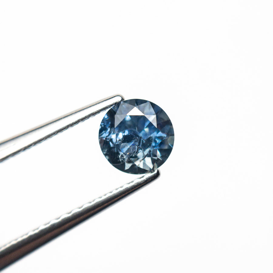 The 0.69ct 5.22x5.17x3.59mm Round Brilliant Sapphire 26556-33 by East London jeweller Rachel Boston | Discover our collections of unique and timeless engagement rings, wedding rings, and modern fine jewellery. - Rachel Boston Jewellery