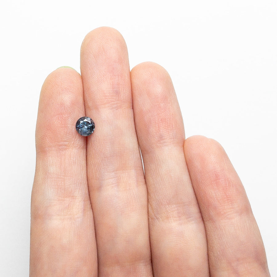 The 0.69ct 5.22x5.17x3.59mm Round Brilliant Sapphire 26556-33 by East London jeweller Rachel Boston | Discover our collections of unique and timeless engagement rings, wedding rings, and modern fine jewellery. - Rachel Boston Jewellery