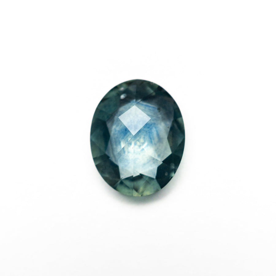 The 1.29ct 8.21x6.64x2.68mm Oval Rosecut Sapphire 26582-01 by East London jeweller Rachel Boston | Discover our collections of unique and timeless engagement rings, wedding rings, and modern fine jewellery. - Rachel Boston Jewellery