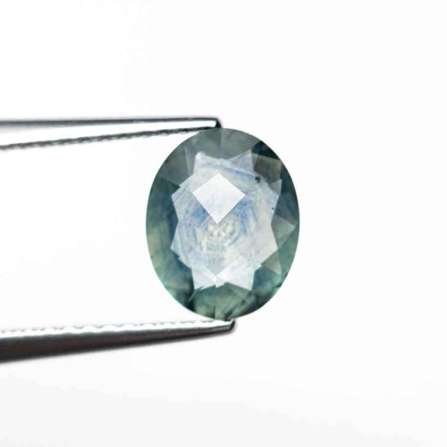 The 1.29ct 8.21x6.64x2.68mm Oval Rosecut Sapphire 26582-01 by East London jeweller Rachel Boston | Discover our collections of unique and timeless engagement rings, wedding rings, and modern fine jewellery. - Rachel Boston Jewellery