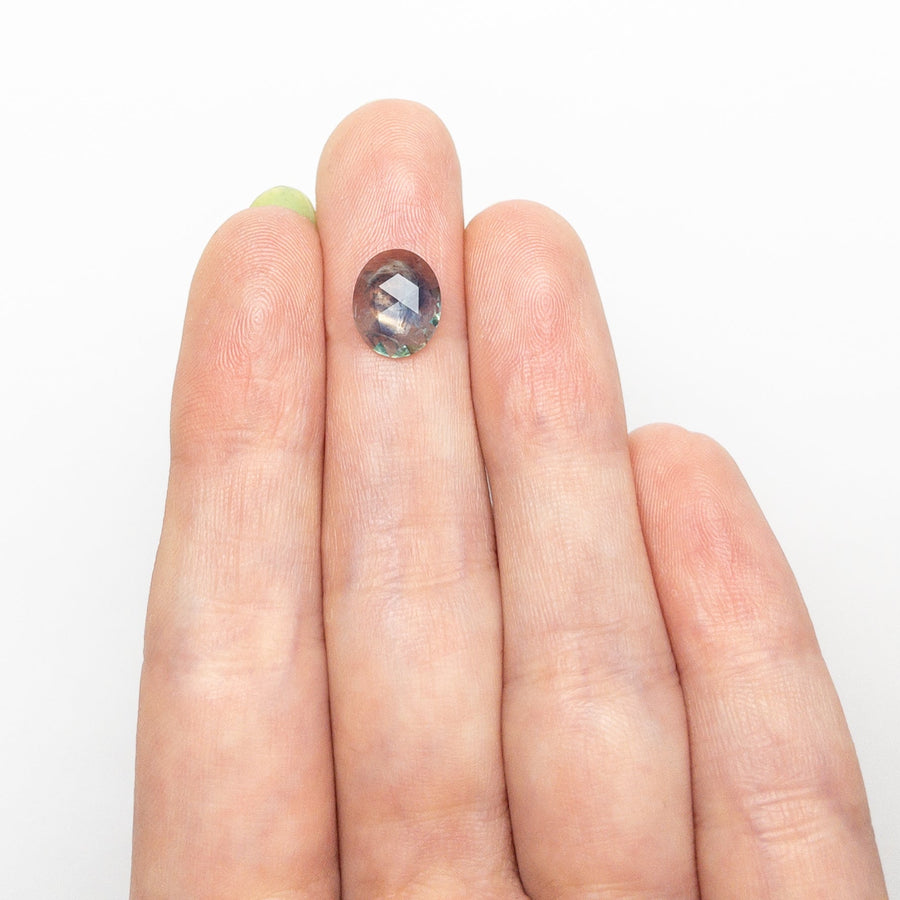 The 1.60ct 9.69x7.90x2.39mm Oval Rosecut Sapphire 26582-06 by East London jeweller Rachel Boston | Discover our collections of unique and timeless engagement rings, wedding rings, and modern fine jewellery. - Rachel Boston Jewellery