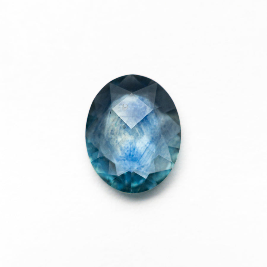 The 1.47ct 8.71x6.95x2.78mm Oval Rosecut Sapphire 26582-11 by East London jeweller Rachel Boston | Discover our collections of unique and timeless engagement rings, wedding rings, and modern fine jewellery. - Rachel Boston Jewellery