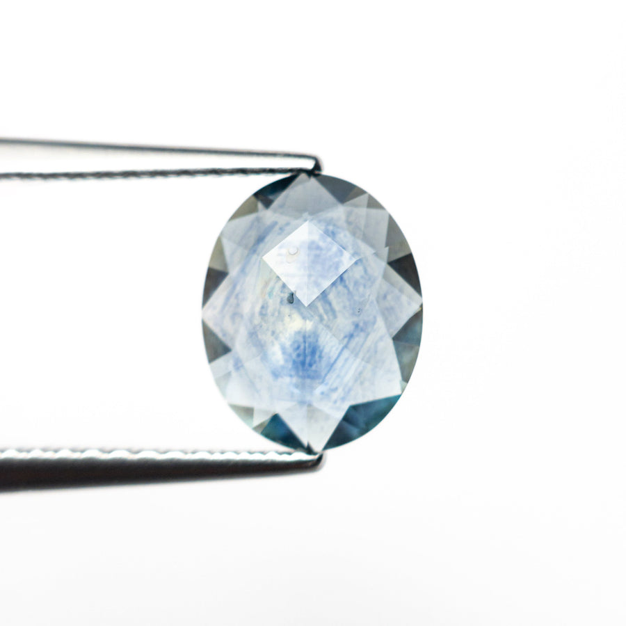 The 1.47ct 8.71x6.95x2.78mm Oval Rosecut Sapphire 26582-11 by East London jeweller Rachel Boston | Discover our collections of unique and timeless engagement rings, wedding rings, and modern fine jewellery. - Rachel Boston Jewellery