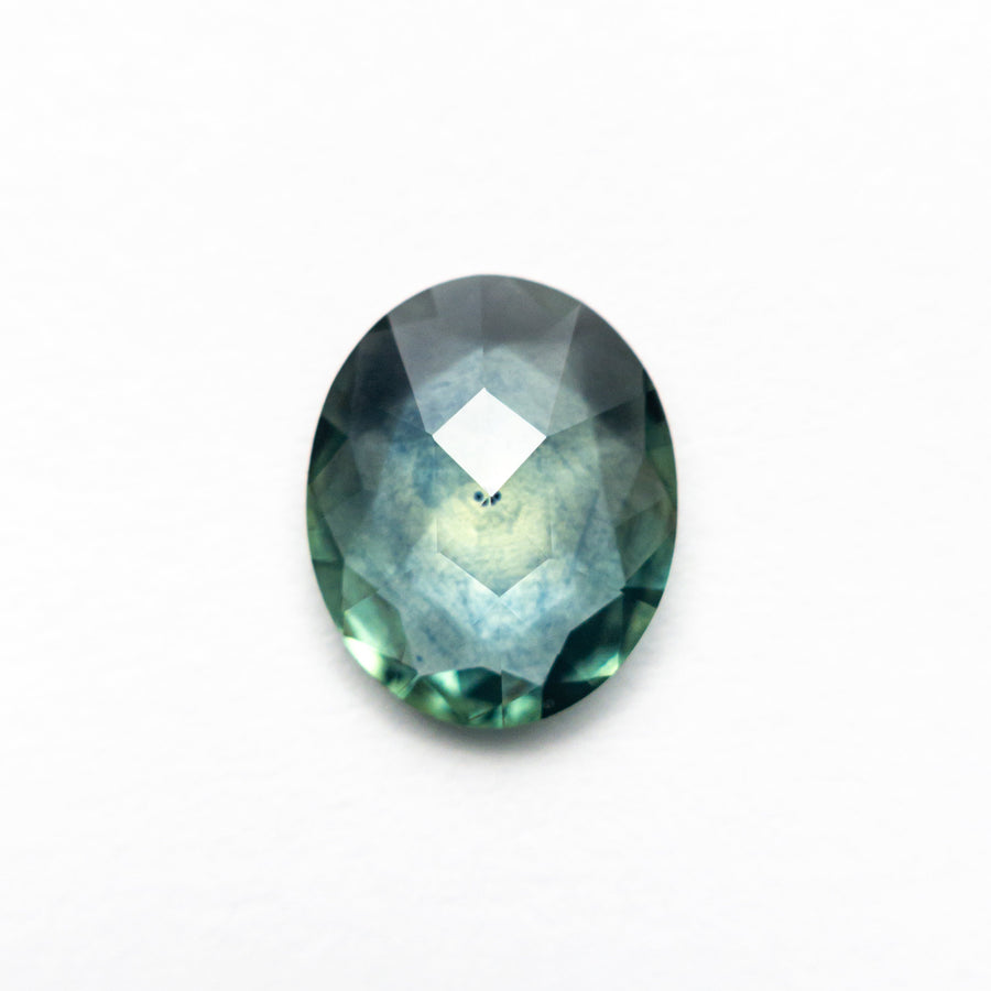 The 1.44ct 8.85x7.23x2.45mm Oval Rosecut Sapphire 26582-16 by East London jeweller Rachel Boston | Discover our collections of unique and timeless engagement rings, wedding rings, and modern fine jewellery. - Rachel Boston Jewellery