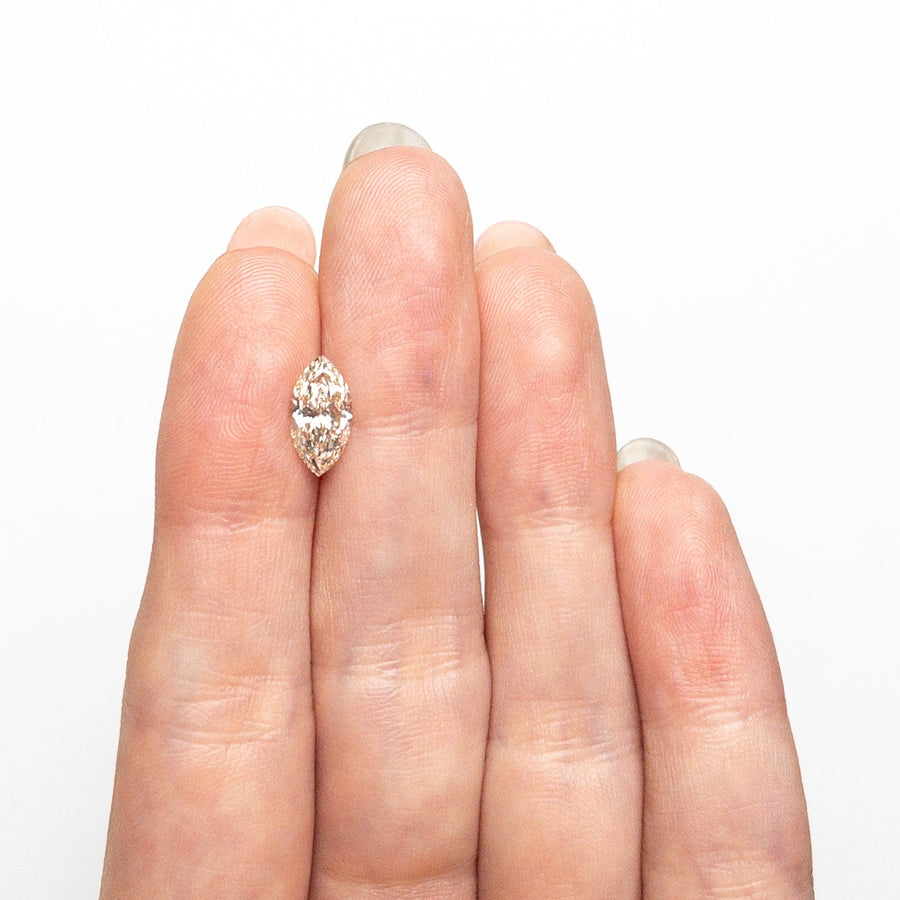 The 1.20ct 10.39x5.45x3.47mm VVS2 N Marquise Brilliant 26590-02 by East London jeweller Rachel Boston | Discover our collections of unique and timeless engagement rings, wedding rings, and modern fine jewellery. - Rachel Boston Jewellery