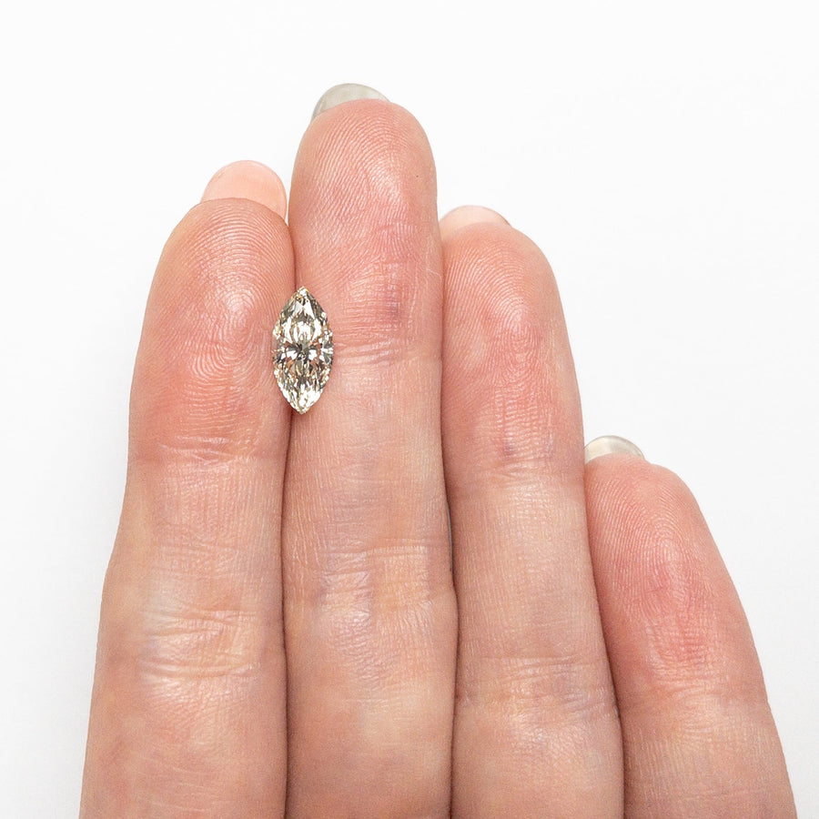 The 1.12ct 11.08x5.35x3.36mm VVS2 N Marquise Brilliant 26590-03 by East London jeweller Rachel Boston | Discover our collections of unique and timeless engagement rings, wedding rings, and modern fine jewellery. - Rachel Boston Jewellery