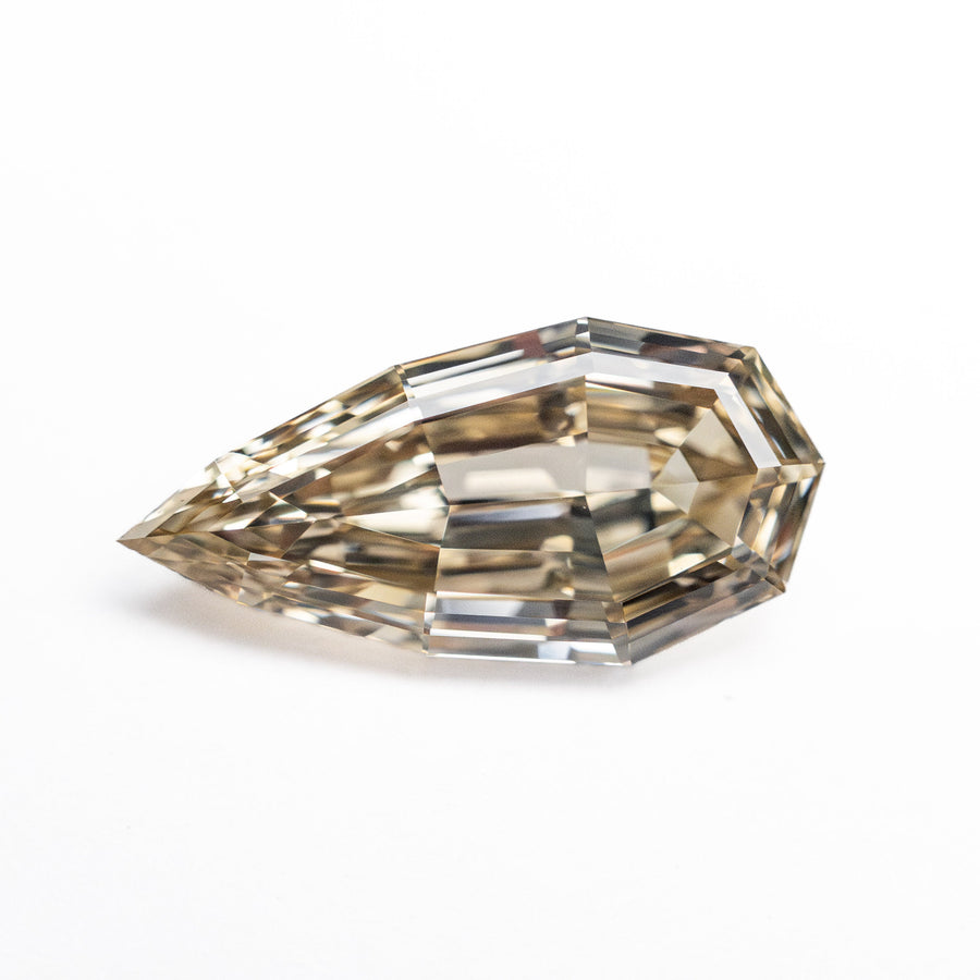 The 1.52ct 12.20x6.02x3.05mm GIA VS1 Fancy Brown Geo Pear Step Cut 🇿🇦 26601-01 by East London jeweller Rachel Boston | Discover our collections of unique and timeless engagement rings, wedding rings, and modern fine jewellery. - Rachel Boston Jewellery