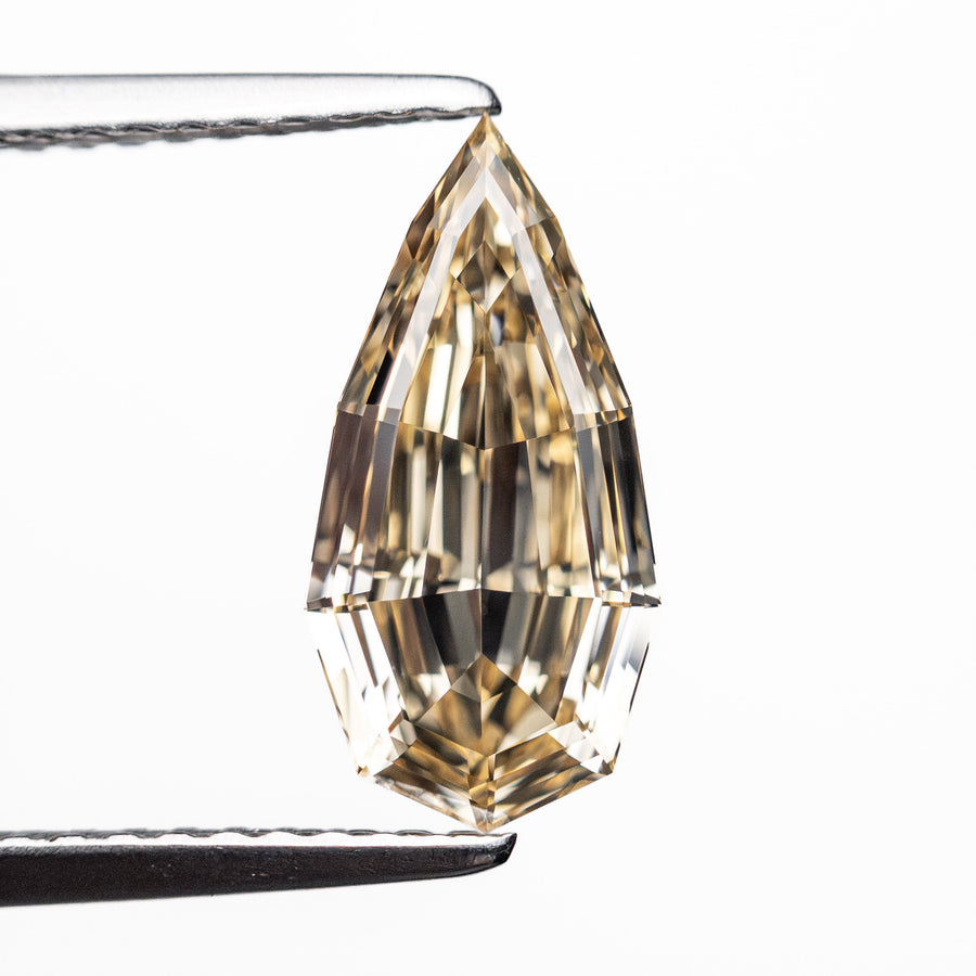 The 1.52ct 12.20x6.02x3.05mm GIA VS1 Fancy Brown Geo Pear Step Cut 🇿🇦 26601-01 by East London jeweller Rachel Boston | Discover our collections of unique and timeless engagement rings, wedding rings, and modern fine jewellery. - Rachel Boston Jewellery