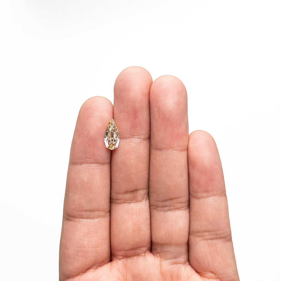 The 1.52ct 12.20x6.02x3.05mm GIA VS1 Fancy Brown Geo Pear Step Cut 🇿🇦 26601-01 by East London jeweller Rachel Boston | Discover our collections of unique and timeless engagement rings, wedding rings, and modern fine jewellery. - Rachel Boston Jewellery