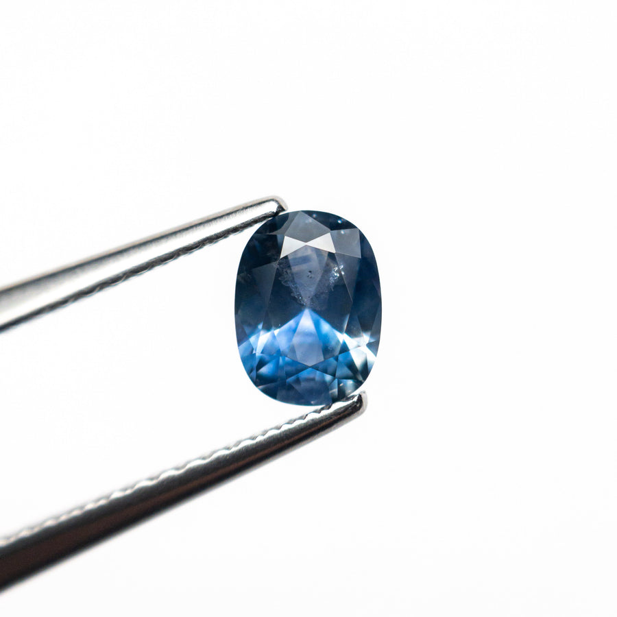 The 0.60ct 5.89x4.41x2.89mm Cushion Brilliant Sapphire 26617-02 by East London jeweller Rachel Boston | Discover our collections of unique and timeless engagement rings, wedding rings, and modern fine jewellery. - Rachel Boston Jewellery