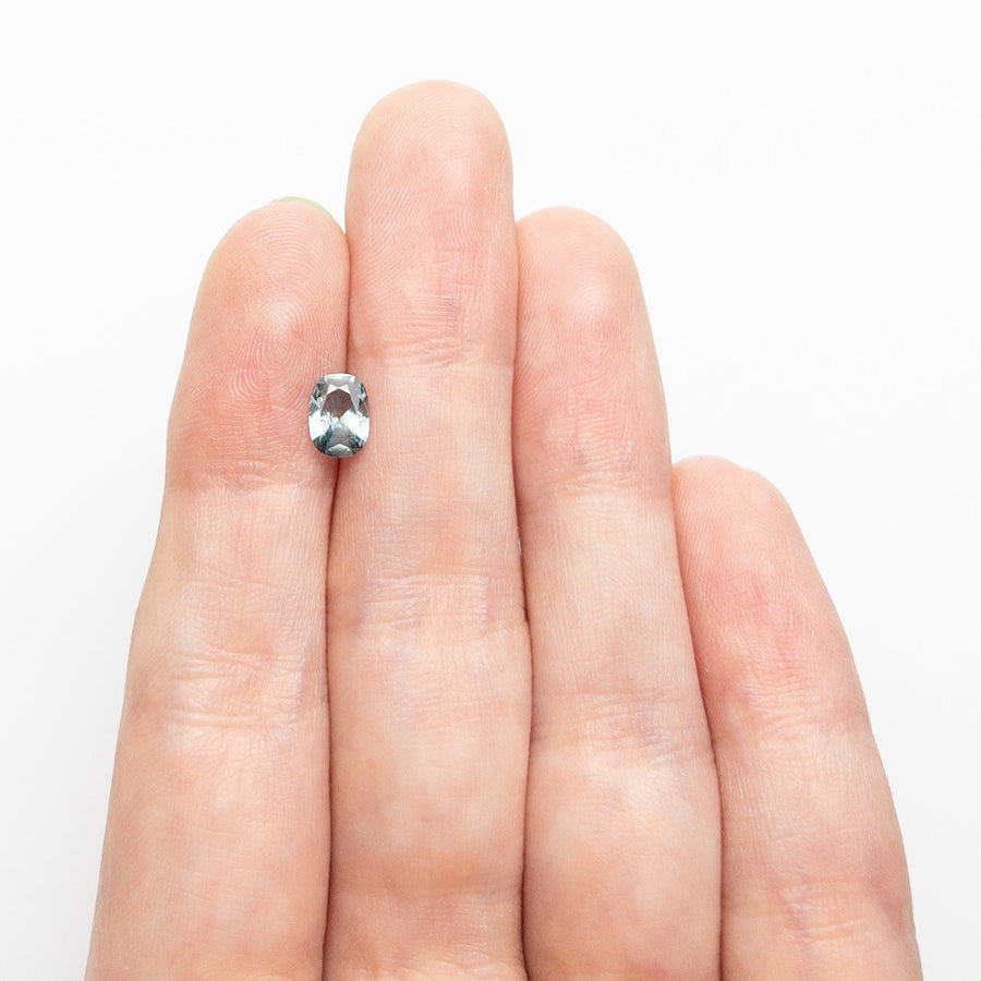 The 0.71ct 6.45x4.75x2.81mm Cushion Brilliant Sapphire 26618-01 by East London jeweller Rachel Boston | Discover our collections of unique and timeless engagement rings, wedding rings, and modern fine jewellery. - Rachel Boston Jewellery