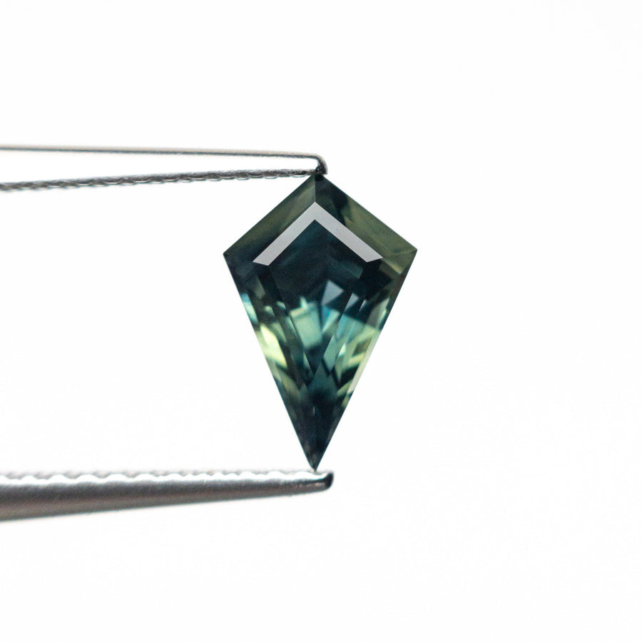 The 0.90ct 8.87x5.80x3.64mm Kite Step Cut Sapphire 26633-04 by East London jeweller Rachel Boston | Discover our collections of unique and timeless engagement rings, wedding rings, and modern fine jewellery. - Rachel Boston Jewellery