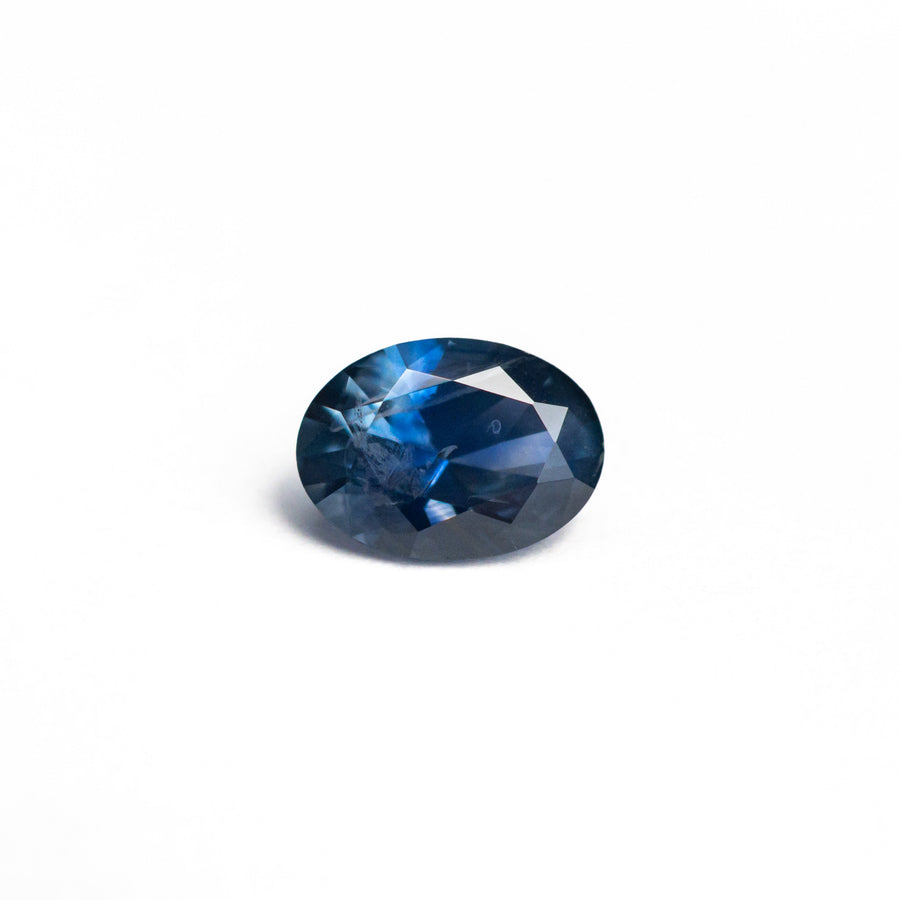 The 0.73ct 6.41x4.65x3.22mm Oval Brilliant Sapphire 26668-13 by East London jeweller Rachel Boston | Discover our collections of unique and timeless engagement rings, wedding rings, and modern fine jewellery. - Rachel Boston Jewellery