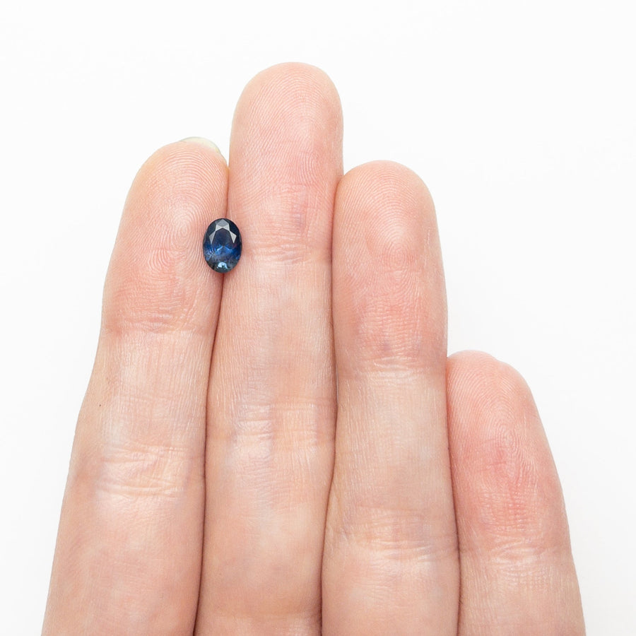 The 0.73ct 6.41x4.65x3.22mm Oval Brilliant Sapphire 26668-13 by East London jeweller Rachel Boston | Discover our collections of unique and timeless engagement rings, wedding rings, and modern fine jewellery. - Rachel Boston Jewellery