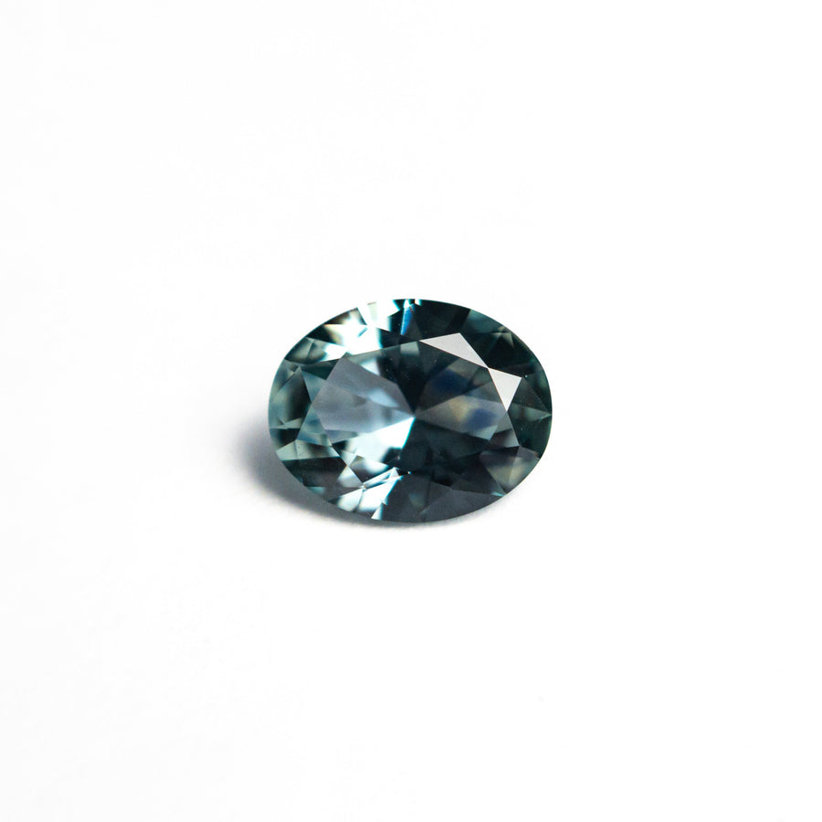 The 0.78ct 6.49x5.15x3.05mm Oval Brilliant Sapphire 26668-30 by East London jeweller Rachel Boston | Discover our collections of unique and timeless engagement rings, wedding rings, and modern fine jewellery. - Rachel Boston Jewellery