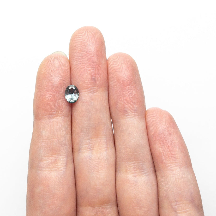 The 0.78ct 6.49x5.15x3.05mm Oval Brilliant Sapphire 26668-30 by East London jeweller Rachel Boston | Discover our collections of unique and timeless engagement rings, wedding rings, and modern fine jewellery. - Rachel Boston Jewellery