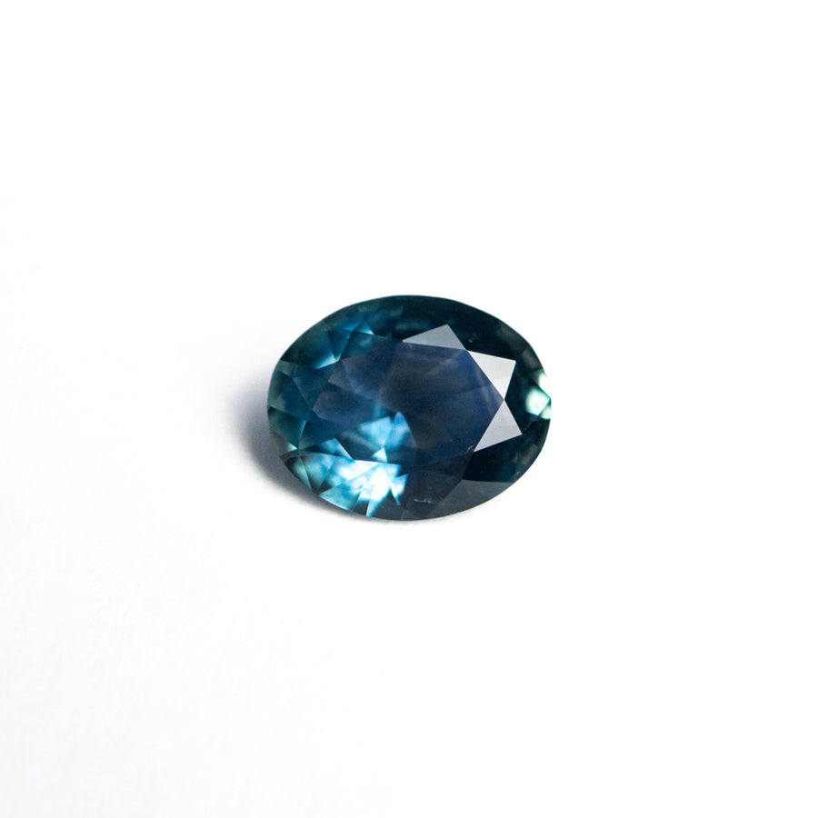 The 0.72ct 6.57x5.25x2.72mm Oval Brilliant Sapphire 26668-31 by East London jeweller Rachel Boston | Discover our collections of unique and timeless engagement rings, wedding rings, and modern fine jewellery. - Rachel Boston Jewellery