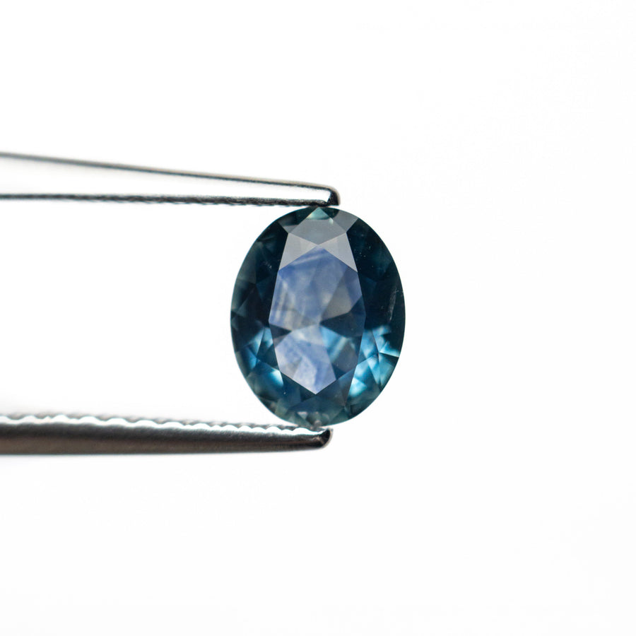 The 0.72ct 6.57x5.25x2.72mm Oval Brilliant Sapphire 26668-31 by East London jeweller Rachel Boston | Discover our collections of unique and timeless engagement rings, wedding rings, and modern fine jewellery. - Rachel Boston Jewellery