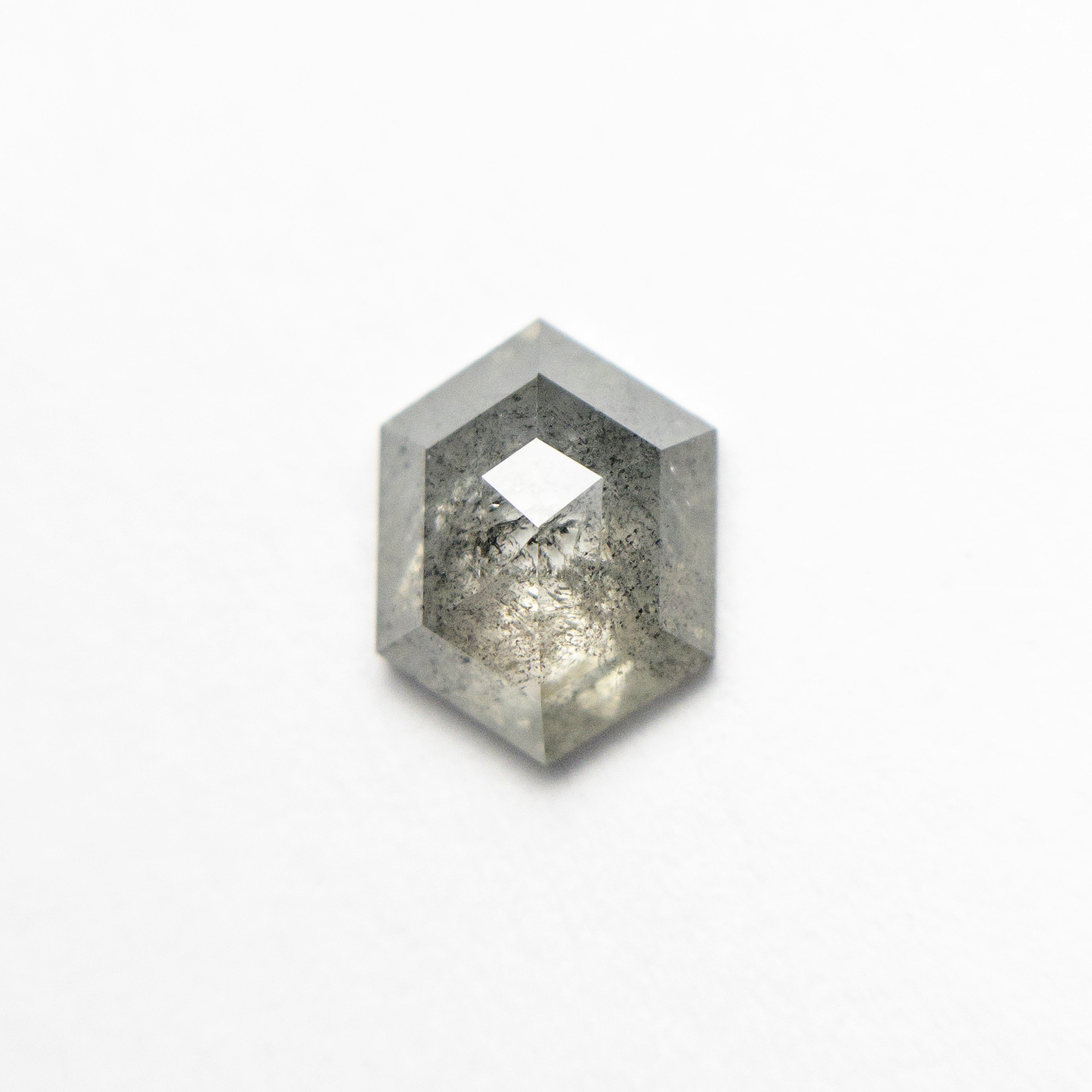 The 0.77ct 7.16x5.47x2.42mm Hexagon Rosecut 26782-36 by East London jeweller Rachel Boston | Discover our collections of unique and timeless engagement rings, wedding rings, and modern fine jewellery.