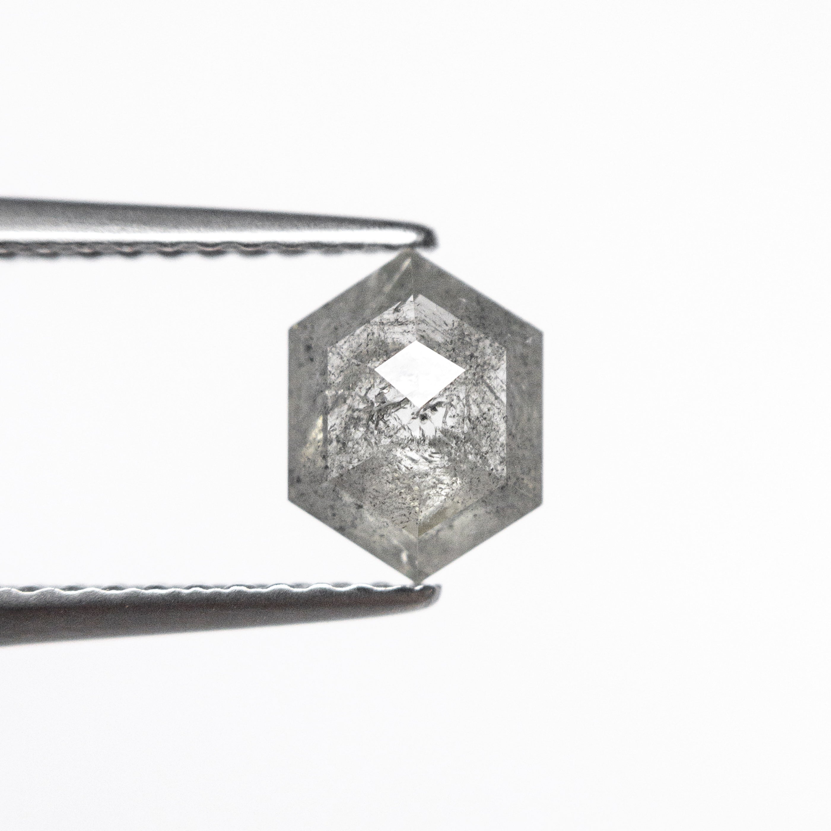 The 0.77ct 7.16x5.47x2.42mm Hexagon Rosecut 26782-36 by East London jeweller Rachel Boston | Discover our collections of unique and timeless engagement rings, wedding rings, and modern fine jewellery.