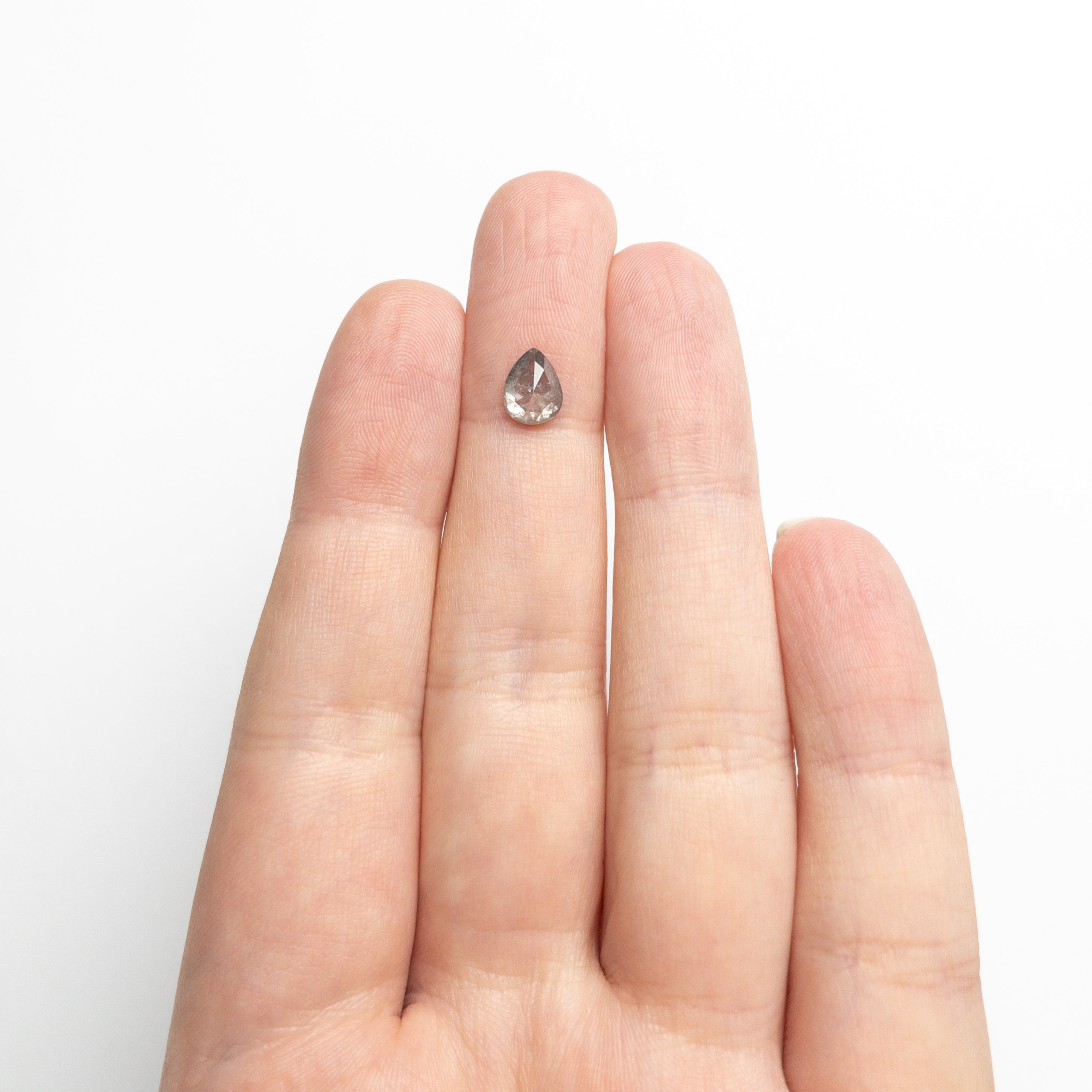 The 1.10ct 7.39x5.77x3.51mm Pear Double Cut 26785-05 by East London jeweller Rachel Boston | Discover our collections of unique and timeless engagement rings, wedding rings, and modern fine jewellery.