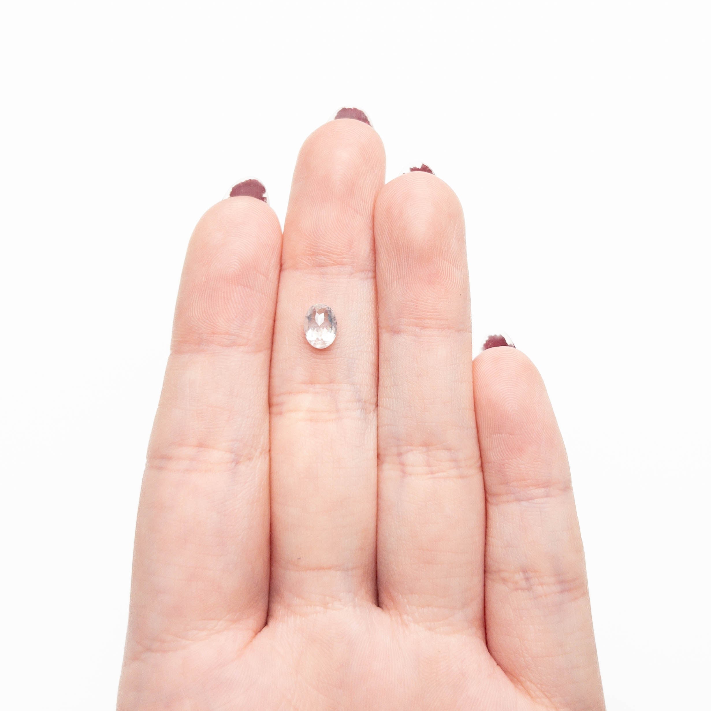 The 0.97ct 7.02x5.21x3.09mm Oval Rosecut 26787-07 by East London jeweller Rachel Boston | Discover our collections of unique and timeless engagement rings, wedding rings, and modern fine jewellery.