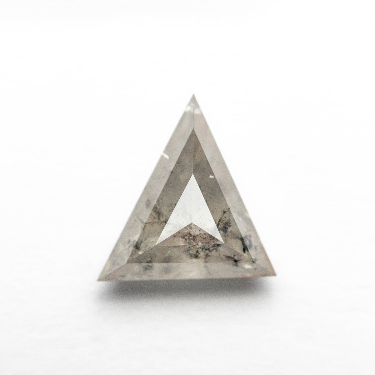 The 1.40ct 8.02x7.81x3.89mm Triangle Step Cut 26787-23 by East London jeweller Rachel Boston | Discover our collections of unique and timeless engagement rings, wedding rings, and modern fine jewellery.