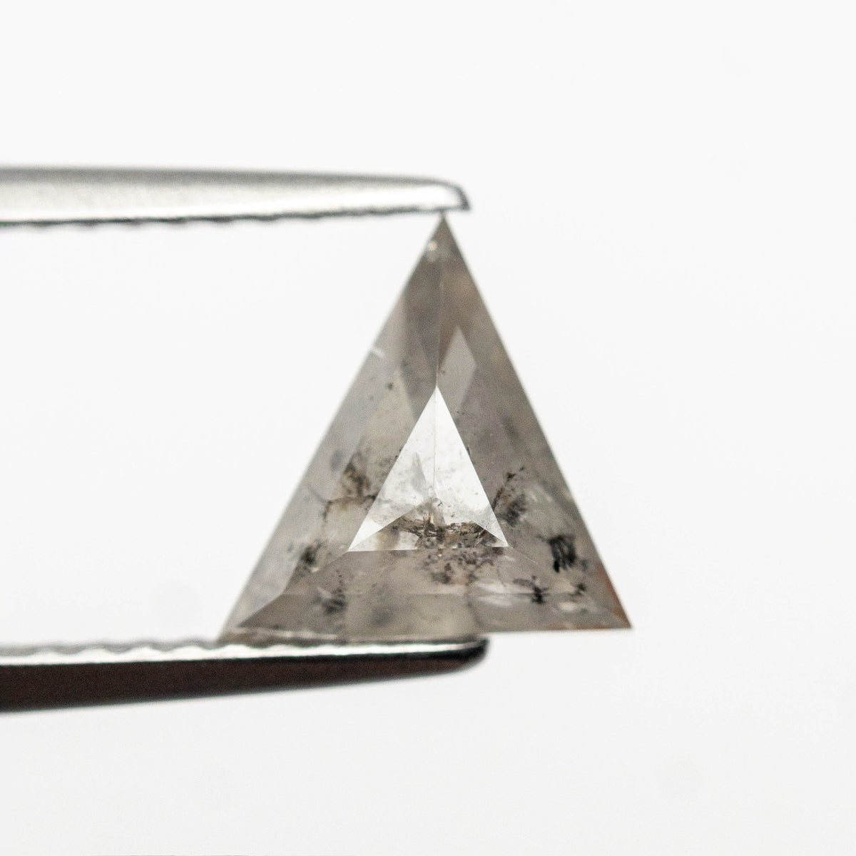 The 1.40ct 8.02x7.81x3.89mm Triangle Step Cut 26787-23 by East London jeweller Rachel Boston | Discover our collections of unique and timeless engagement rings, wedding rings, and modern fine jewellery.