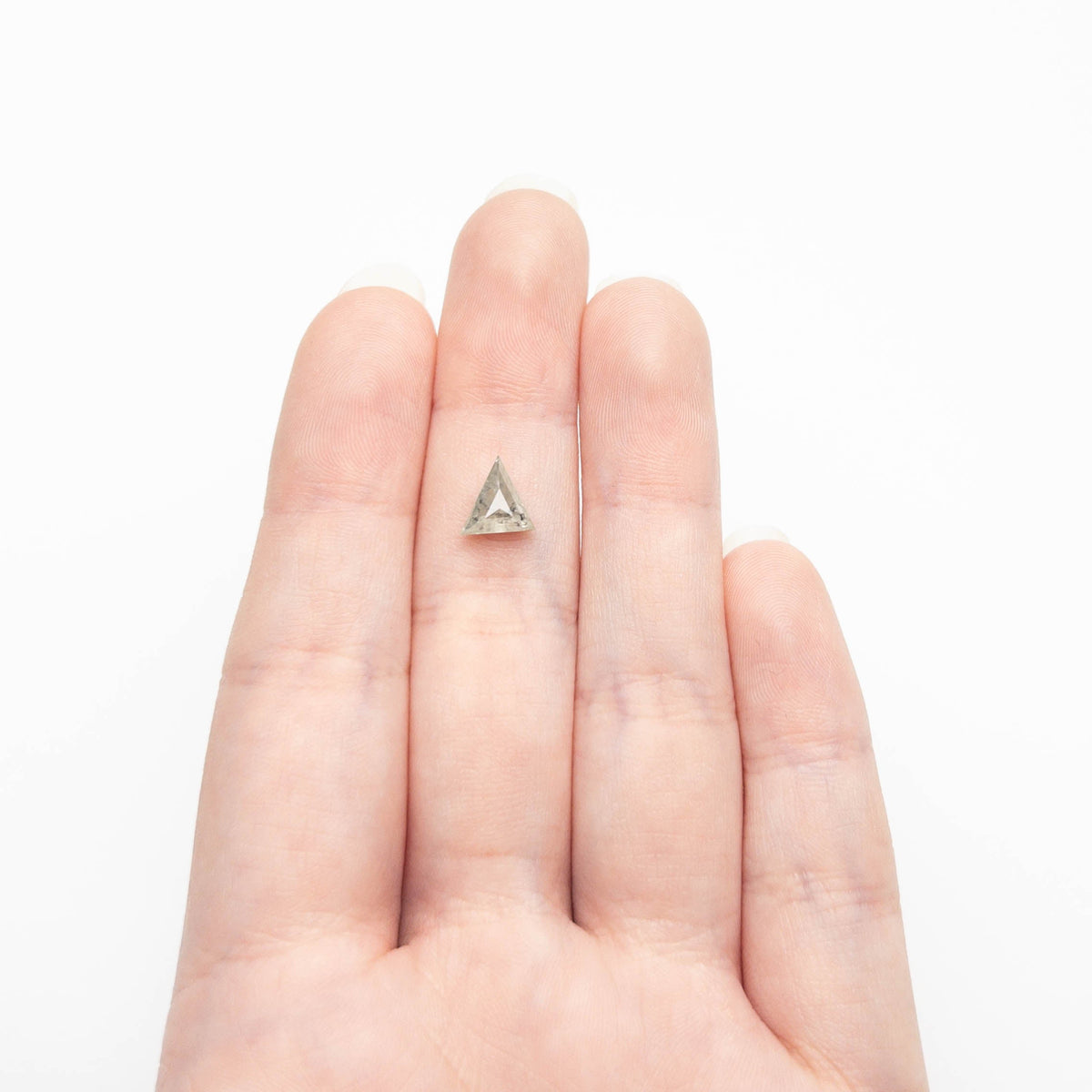 The 1.40ct 8.02x7.81x3.89mm Triangle Step Cut 26787-23 by East London jeweller Rachel Boston | Discover our collections of unique and timeless engagement rings, wedding rings, and modern fine jewellery.