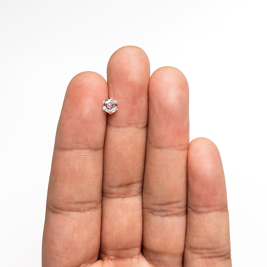 The 0.61ct 5.73x4.89x3.04mm SI1 M Hexagon Step Cut 🇨🇦 26844-01 by East London jeweller Rachel Boston | Discover our collections of unique and timeless engagement rings, wedding rings, and modern fine jewellery. - Rachel Boston Jewellery
