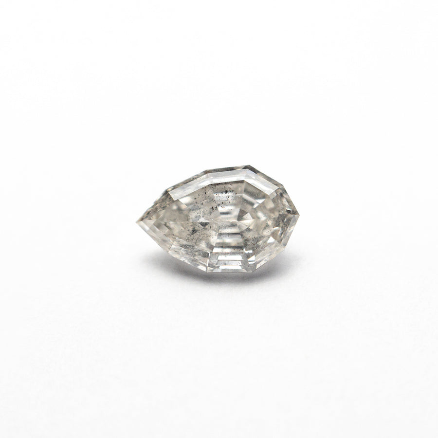 The 0.65ct 7.04x4.61x2.84mm Geo Pear Step Cut 🇨🇦 26846-01 by East London jeweller Rachel Boston | Discover our collections of unique and timeless engagement rings, wedding rings, and modern fine jewellery. - Rachel Boston Jewellery