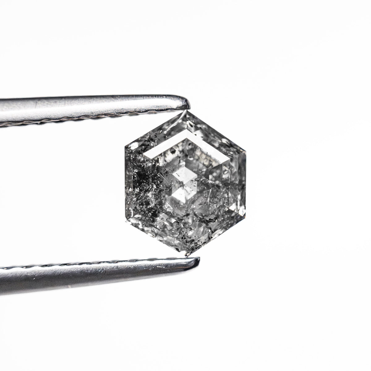 The 1.13ct 6.65x 5.52x4.06mm Hexagon Step Cut 🇨🇦 26872-01 by East London jeweller Rachel Boston | Discover our collections of unique and timeless engagement rings, wedding rings, and modern fine jewellery.