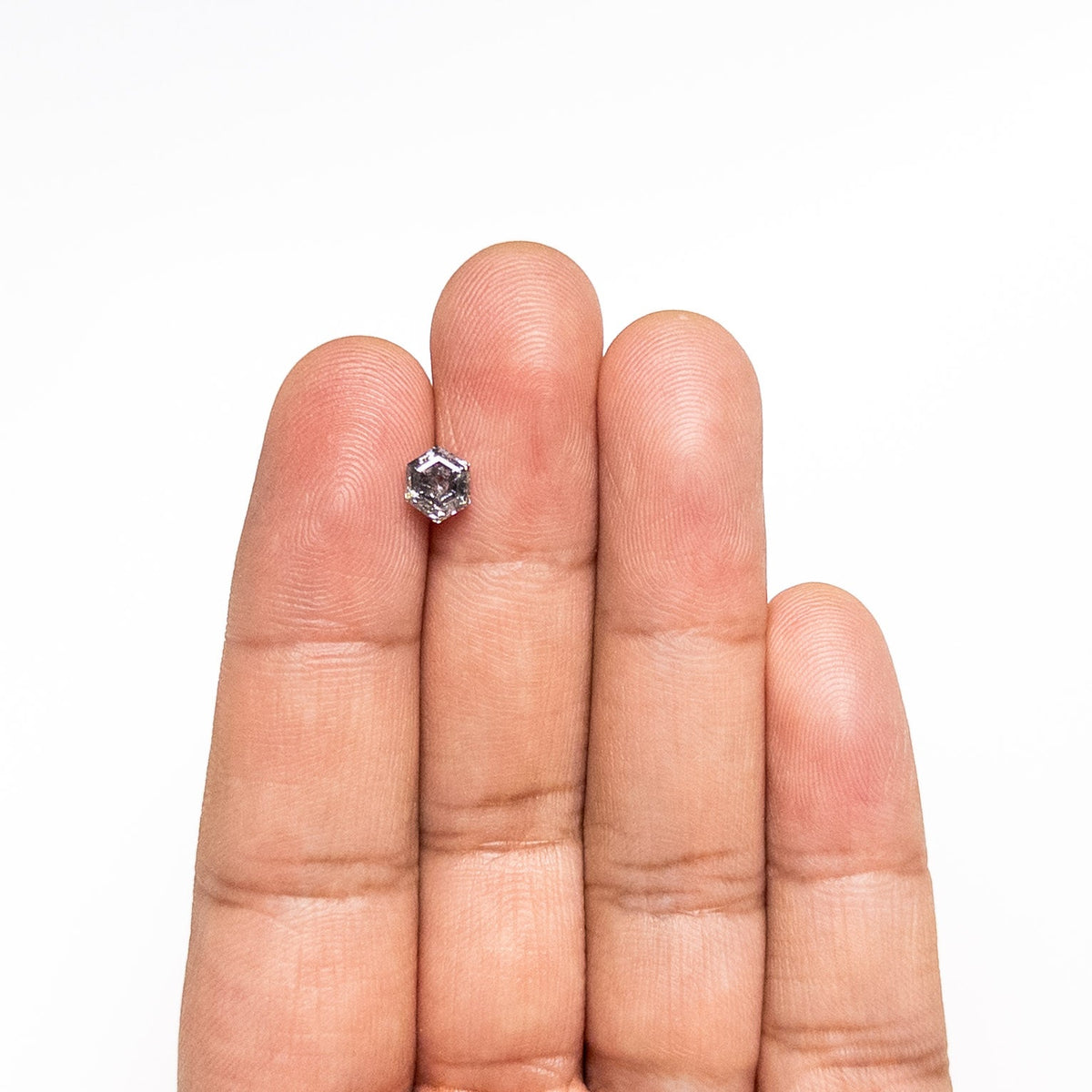 The 1.13ct 6.65x 5.52x4.06mm Hexagon Step Cut 🇨🇦 26872-01 by East London jeweller Rachel Boston | Discover our collections of unique and timeless engagement rings, wedding rings, and modern fine jewellery.